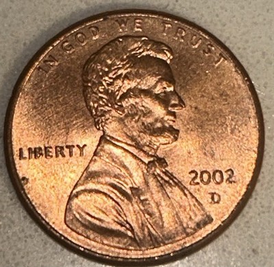 2002 penny BIE die break error showing raised blob between B and E letters in LIBERTY inscription